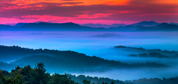 Misty Morning at the Blue Ridge Mountains: A Symphony of Blue and Red
